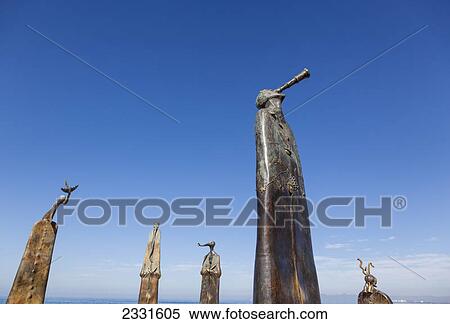 The rotunda of the sea is one of the popular sculptures on the malecon; Puerto vallarta mexico View Large Photo Image Stock Photography - The rotunda of the sea is one of the popular sculptures on the malecon; Puerto vallarta mexico. Fotosearch