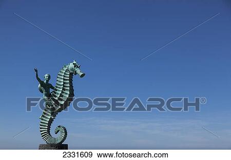The seahorse sculpture on the malecon; Puerto vallarta mexico View Large Photo Image Stock Photo - The seahorse sculpture on the malecon; Puerto vallarta mexico. Fotosearch