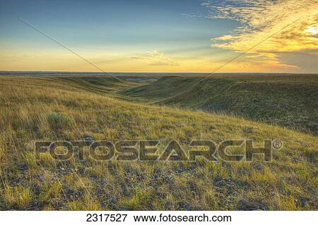 The Sunset Over Grasslands National Park; Saskatchewan Canada View Large Photo Image Stock Photo - The Sunset Over Grasslands National Park; Saskatchewan Canada. Fotosearch