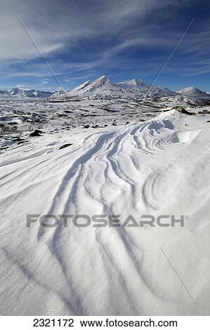 The View Near The Haines Summit Along The Haines Highway Where Snow Has Drifted; British Columbia Canada View Large Photo Image Stock Image - The View Near The Haines Summit Along The Haines Highway Where Snow Has Drifted; British Columbia Canada. Fotosearch