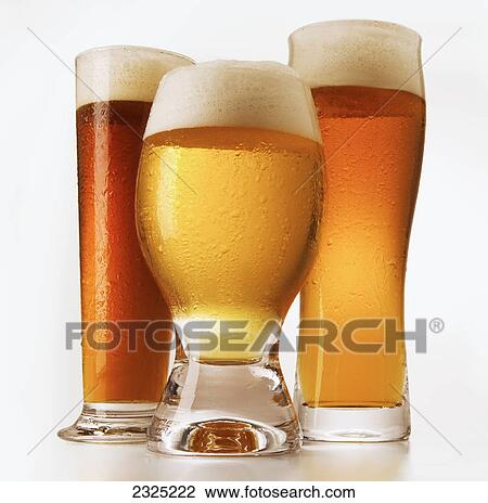 Three glasses of cold beer with foam on top View Large Photo Image Stock Image - Three glasses of cold beer with foam on top. Fotosearch