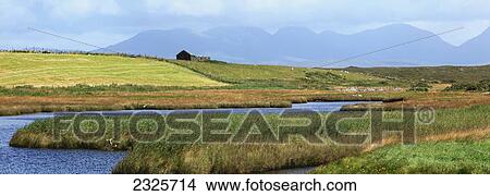 Twelve bens mountain range near ballyconneely; County galway ireland View Large Photo Image Picture - Twelve bens mountain range near ballyconneely; County galway ireland. Fotosearch