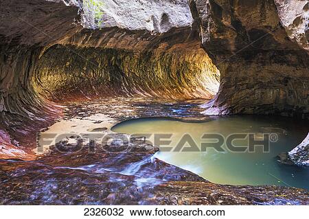 Utah, Zion National Park, Subway Slot Canyon, Stunning cavern and pool of water. View Large Photo Image Stock Image - Utah, Zion National Park, Subway Slot Canyon, Stunning cavern and pool of water.. Fotosearch