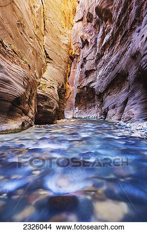 Picture - Utah, Zion National Park, Virgin River, Flowing river, Canyon narrows.. Fotosearch