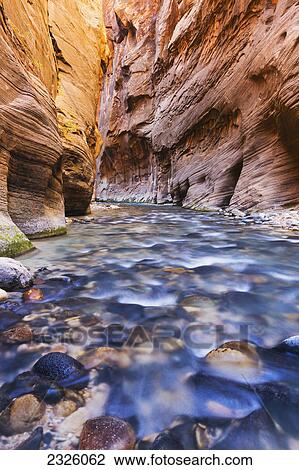 Utah, Zion National Park, Virgin River, Long exposure of flowing river, Canyon narrows. View Large Photo Image Stock Image - Utah, Zion National Park, Virgin River, Long exposure of flowing river, Canyon narrows.. Fotosearch