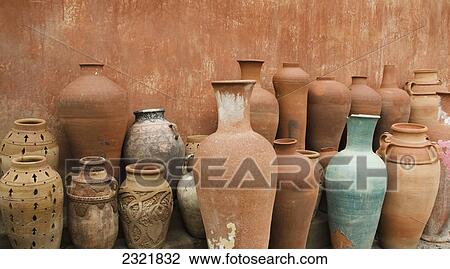 Variety Of Clay Pots Against A Wall; Morocco View Large Photo Image Stock Image - Variety Of Clay Pots Against A Wall; Morocco. Fotosearch