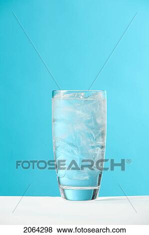 Stock Photo - Very Full Glass Of Water With Ice. Fotosearch