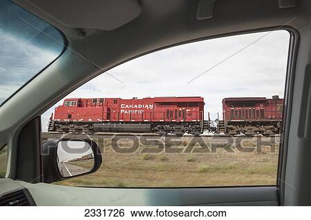 View of a train through a car window; Alberta canada View Large Photo Image Stock Photograph - View of a train through a car window; Alberta canada. Fotosearch