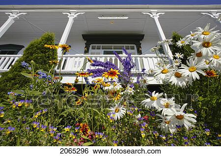 Stock Photograph - View Of Auberge Manoir Tache (Inn) And Flowers, Bas-Saint-Laurent Region, Quebec, Canada. Fotosearch