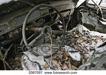 View Of Automobile In Junkyard, Montérégie Region, Quebec View Large Photo Image Stock Photo - View Of Automobile In Junkyard, Montérégie Region, Quebec. Fotosearch