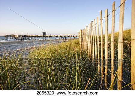 Stock Image - View Of Beach At Sunrise, New Jersy, Usa. Fotosearch