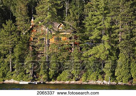 View Of Lake Sacacomie And House, Quebec, Canada View Large Photo Image Stock Photo - View Of Lake Sacacomie And House, Quebec, Canada. Fotosearch