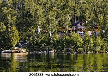 View Of Lake Sacacomie And House, Quebec, Canada View Large Photo Image Stock Photo - View Of Lake Sacacomie And House, Quebec, Canada. Fotosearch