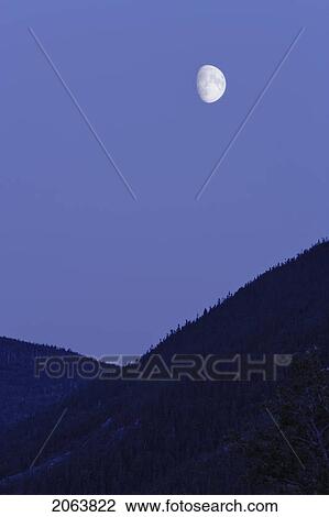 Stock Image - View Of Moon And Mountains, Gaspesie, Quebec. Fotosearch