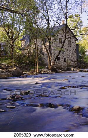Stock Photo - View Of Old Freligh Mill And Brochets River, Eastern Townships, Quebec, Canada.. Fotosearch