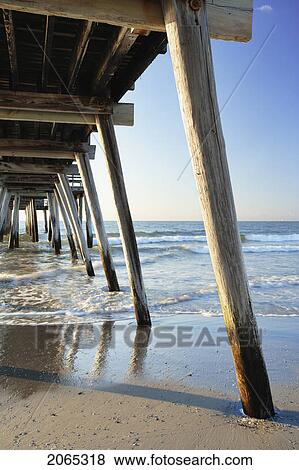 View Of Pier And Beach At Sunrise, New Jersy, Usa. View Large Photo Image Stock Photo - View Of Pier And Beach At Sunrise, New Jersy, Usa.. Fotosearch
