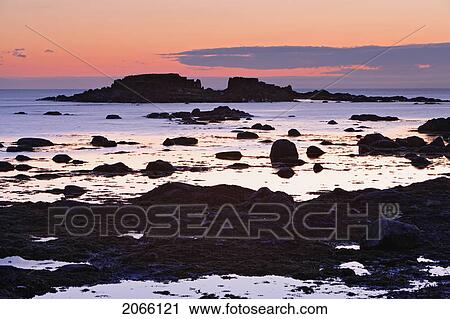 View Of Rock And Sea At Twilight, L'anse Aux Meadows, Newfoundland, Canada View Large Photo Image Stock Image - View Of Rock And Sea At Twilight, L'anse Aux Meadows, Newfoundland, Canada. Fotosearch