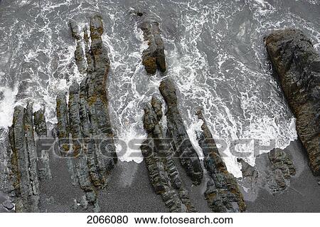 Stock Image - View Of Rock And Wave, Trinity, Newfoundland, Canada. Fotosearch