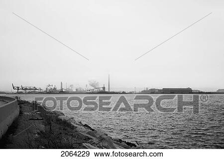 View Of Steel Manufacting Plant On Hamilton's Industrial Coastline View Large Photo Image Stock Photo - View Of Steel Manufacting Plant On Hamilton's Industrial Coastline. Fotosearch