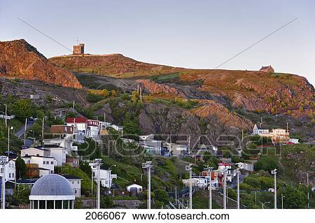 View Of The Battery And Cabot Tower (Signal Hill National Historic Site) At Sunset, St. John's, Newfoundland, Canada View Large Photo Image Stock Photo - View Of The Battery And Cabot Tower (Signal Hill National Historic Site) At Sunset, St. John's, Newfoundland, Canada. Fotosearch