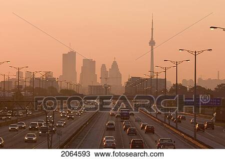 View Of Toronto Skyline From Above Queen Elizabeth Way Highway During Start Of Rush Hour Traffic, Toronto, Ontario, Canada. View Large Photo Image Stock Image - View Of Toronto Skyline From Above Queen Elizabeth Way Highway During Start Of Rush Hour Traffic, Toronto, Ontario, Canada.. Fotosearch