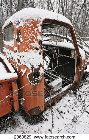 Stock Photo - View Of Truck In Junkyard. Montérégie Region, Quebec. Fotosearch