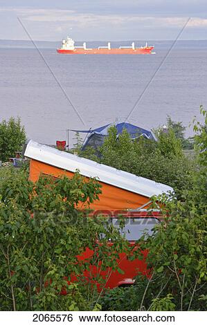 View Of Westfalia And Cargo Boat On St. Lawrence River, Quebec, Canada. View Large Photo Image Stock Photograph - View Of Westfalia And Cargo Boat On St. Lawrence River, Quebec, Canada.. Fotosearch