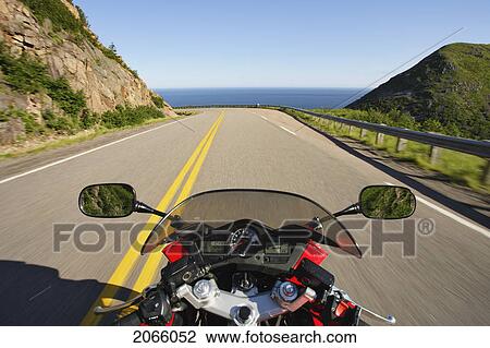 Stock Image - View On Motorcycle In Action On Cabot Trail, Cape Breton Highlands National Park, Nova Scotia, Canada. Fotosearch