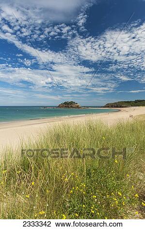 Stock Image - View over dunes and along beach to the fort du guesclin near cancale; Brittany france. Fotosearch