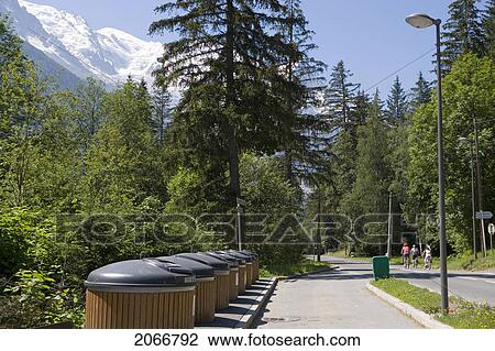 Stock Image - Waste And Recycling Bins, Sorted Into Paper, Glass, Plastic, And Garbage, Chamonix, France. Fotosearch