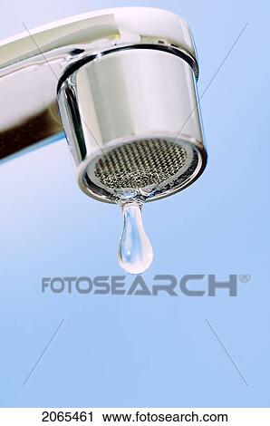 Stock Image - Water Drips From Kitchen Tap.. Fotosearch