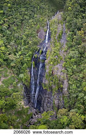 Stock Photograph - Waterfall In New Caledonia, (Located Almost Directly Between Australia And Fiji).. Fotosearch