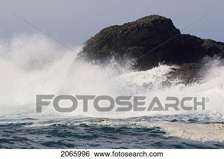Waves Crashing On Rocks, Chesterman Beach, Tofino, Vancouver Island, Bc View Large Photo Image Stock Photograph - Waves Crashing On Rocks, Chesterman Beach, Tofino, Vancouver Island, Bc. Fotosearch