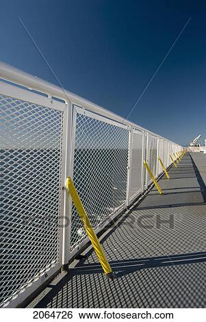 Stock Photograph - White Railing And Blue Sky Of A Ferry Boat, Bc Ferries, Nanaimo, Bc, Canada. Fotosearch