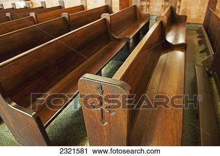 Wooden Pews In A Church With Crosses Etched Into The Ends; New Orleans Mississippi United States Of America View Large Photo Image Stock Image - Wooden Pews In A Church With Crosses Etched Into The Ends; New Orleans Mississippi United States Of America. Fotosearch