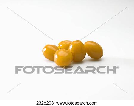 Yellow plum tomatoes on a white background View Large Photo Image Stock Image - Yellow plum tomatoes on a white background. Fotosearch