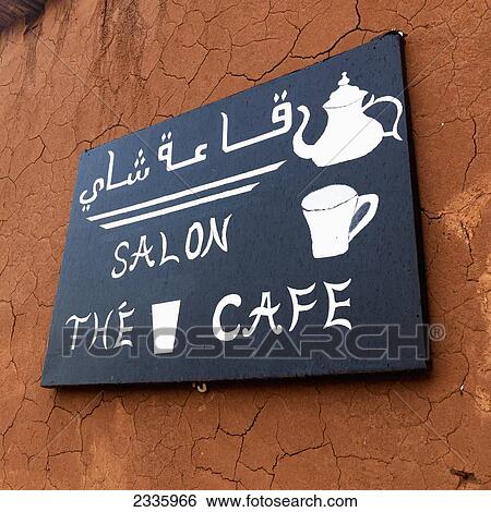 A bilingual sign for a cafe View Large Photo Image Stock Photograph - A bilingual sign for a cafe. Fotosearch