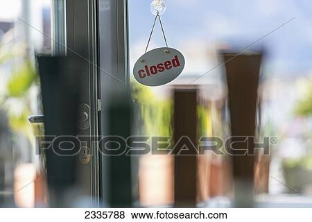 A closed sign on a shop door View Large Photo Image Stock Photo - A closed sign on a shop door. Fotosearch