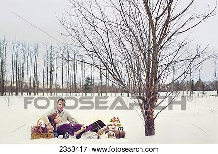 A couple having a winter picnic during pregnancy; Edmonton, Alberta, Canada View Large Photo Image Stock Photo - A couple having a winter picnic during pregnancy; Edmonton, Alberta, Canada. Fotosearch