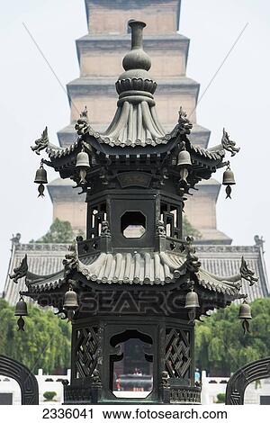 A metal structure with chinese architecture and a tower in the background View Large Photo Image Stock Image - A metal structure with chinese architecture and a tower in the background. Fotosearch