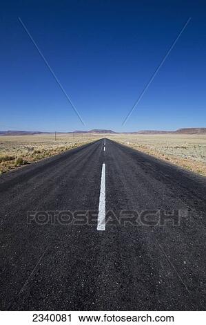 A paved road in a rural area with blue sky; Namibia View Large Photo Image Stock Image - A paved road in a rural area with blue sky; Namibia. Fotosearch