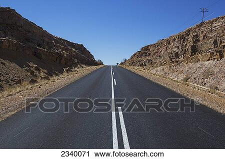 A road with a blue sky; Klein-Aus, Namibia View Large Photo Image Stock Image - A road with a blue sky; Klein-Aus, Namibia. Fotosearch