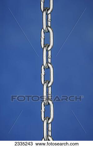 A silver chain on a blue background View Large Photo Image Stock Image - A silver chain on a blue background. Fotosearch