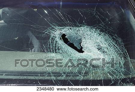 A smashed windshield with a hole in it; Canada View Large Photo Image Stock Image - A smashed windshield with a hole in it; Canada. Fotosearch