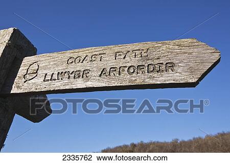 A wooden sign for a Wales Coast Path; Wales View Large Photo Image Stock Image - A wooden sign for a Wales Coast Path; Wales. Fotosearch