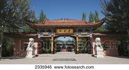 An entrance in traditional japanese architecture and two lion statues on either side View Large Photo Image Stock Photograph - An entrance in traditional japanese architecture and two lion statues on either side. Fotosearch