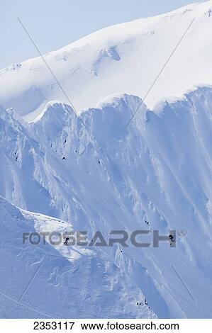 Backcountry skiing in the Chugach Mountains in late winter; Southcentral Alaska, United States of America View Large Photo Image Stock Photo - Backcountry skiing in the Chugach Mountains in late winter; Southcentral Alaska, United States of America. Fotosearch