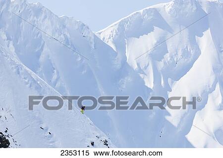 Stock Photography - Backcountry skiing in the Chugach Mountains in late winter; Southcentral Alaska, United States of America. Fotosearch
