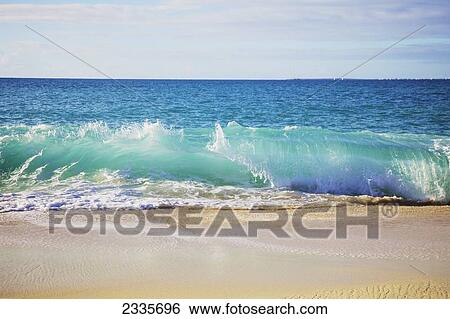 Stock Photograph - Beach at Baie Rouge; St. Martin, French West Indies. Fotosearch