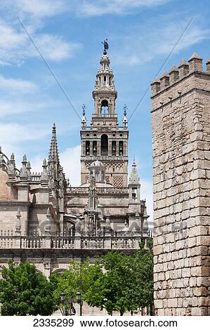 Bell tower of Seville Cathedral; Seville, Andalusia, Spain View Large Photo Image Stock Photo - Bell tower of Seville Cathedral; Seville, Andalusia, Spain. Fotosearch